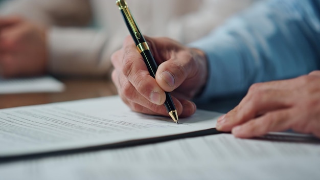 Closeup ceo hands signing contract office unknown man writing pen signature