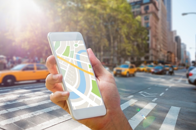 Composite image of man using map app on phone