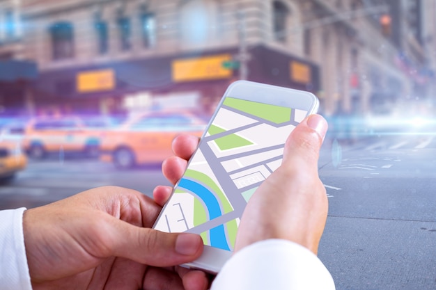 Composite image of man using map app on phone