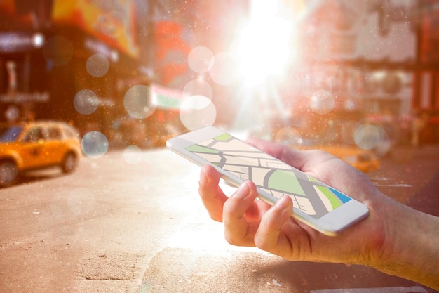 Composite image of man using map app on phone