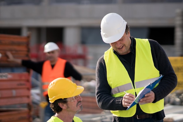 coworkers working at construction site