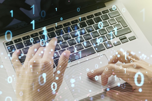 Creative abstract binary code hologram and hands typing on computer keyboard on background AI and machine learning concept Multiexposure