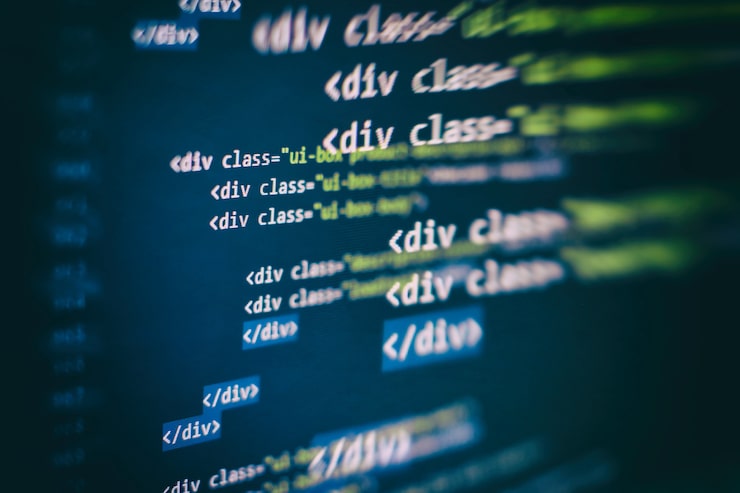 Foto css, javascript and html usage. monitor closeup of function source code. abstract it technology background. software source code.
