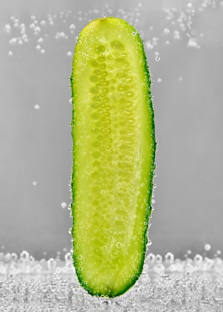 Cut cucumber in water. design element