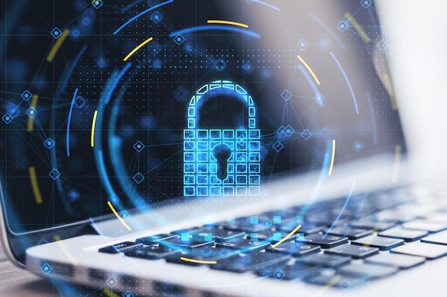cyber security and data protection concept with digital graphic glowing blue lock symbol with keyhole on modern laptop background double exposure