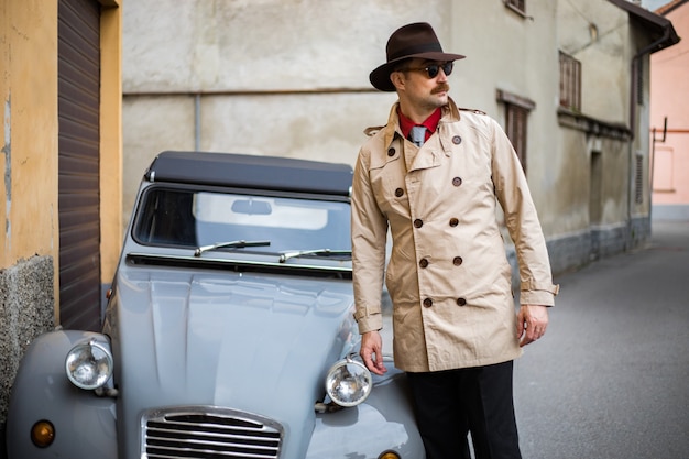 Detective walking in the city slums