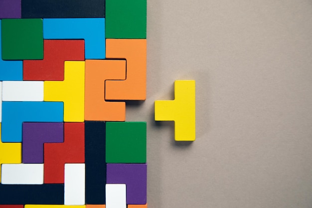 Different colorful shapes wooden blocks Geometric shapes in different colors
