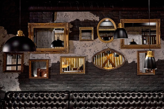 Different shapes of mirrors on the wall