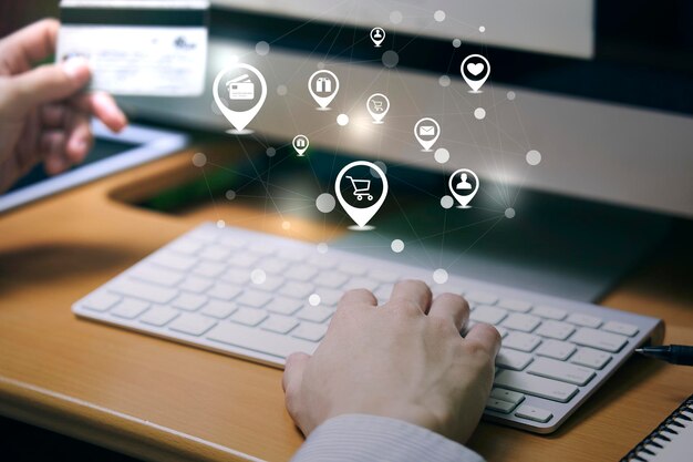 Digital composite image of man using computer on table