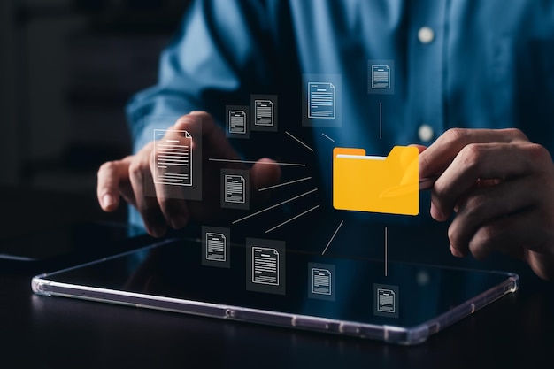 document management system concept business man holding folder and document icon software searching and managing files online document database for efficient archiving and company data