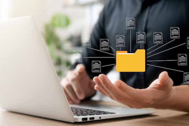 document management system concept business man holding folder and document icon software searching and managing files online document database for efficient archiving and company data