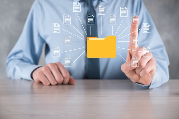 document management system dms .businessman hold folder and document icon.software for archiving,