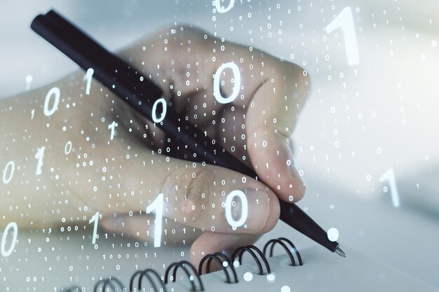 double exposure of creative abstract binary code hologram and man hand writing in notebook on background database and programming concept