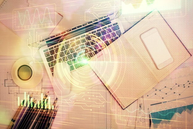 double exposure of data drawing hologram over topview of study desk background with computer concept of ai