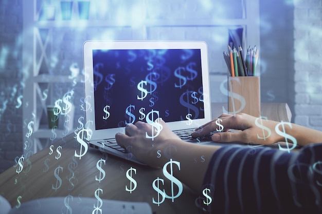 Double exposure of woman hands typing on computer and forex chart hologram drawing Stock market invest concept