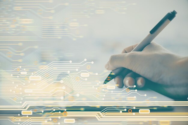 double exposure of writing hands on background with data solution hologram on front technology concept close up