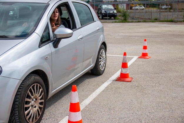Driving school or test training parking how to drive and park car between cones