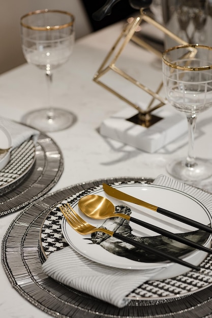 Elegant Gold and Black Table Setting
