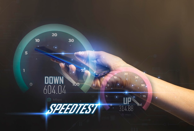 fast internet connection speedtest network bandwidth technology Man using high speed internet with smartphone and laptop computer 5G quality speed optimization