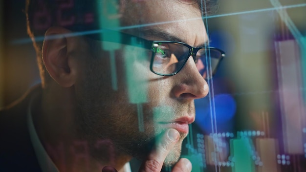 Financial trader check data in holographic numbers closeup pensive busy analyst