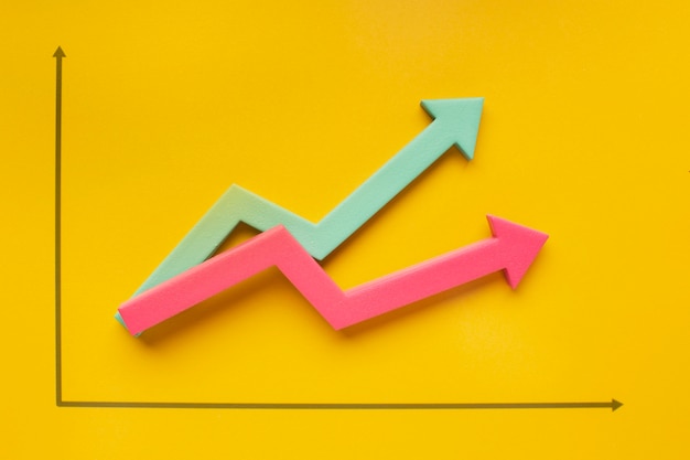 Flat lay of growth statistics presentation with arrow