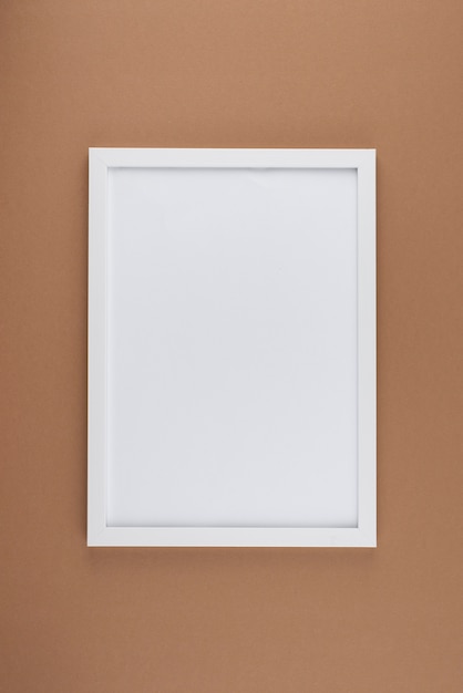 flat lay of photo frame on textured surface