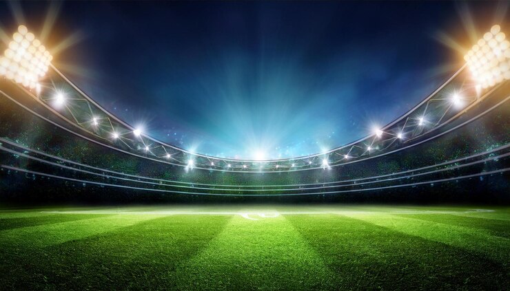 Foto football night stadium background with lights and green grass 17185