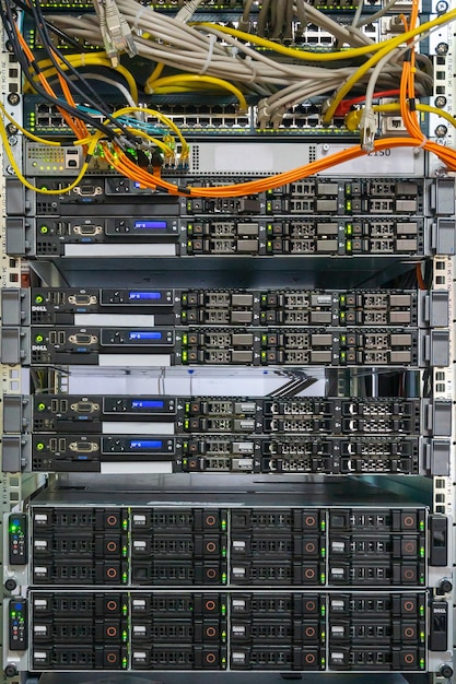 front side of network servers in the rack with cable connections controllers and hard disks