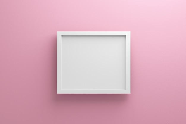 front view of empty frame on light pink wall 