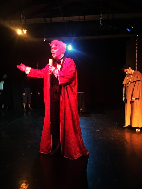 Full length of man in costume performing on stage