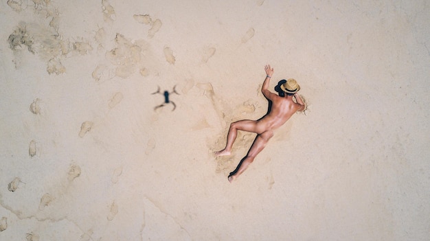Full length of man in sand