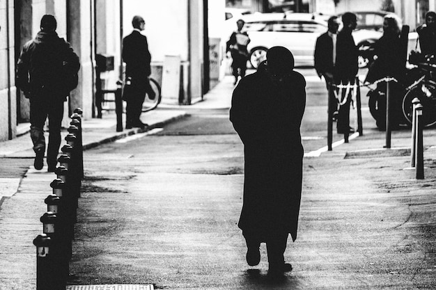 full length of man walking on street