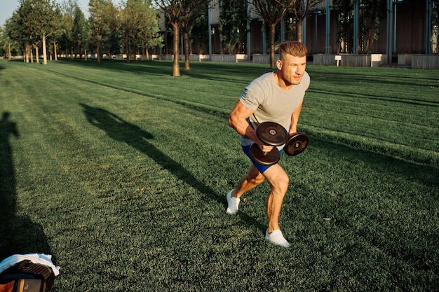 Full length of woman exercising on field