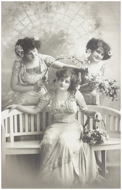 GERMANY, AAHEN - CIRCA 1911: old photo of three edwardian women, selebrating birthday. Illustrative Image, subject of human interest.