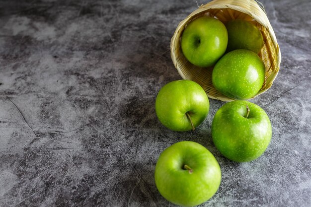 Green apples in a basket