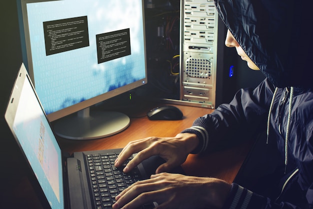 Hacker in the dark breaks the access to steal information
