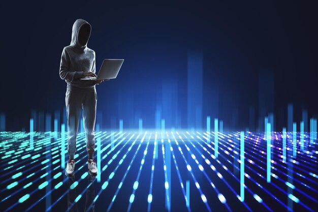 Hacker with laptop standing on creative blue metaverse background Digital future data hacking and cyberpunk concept