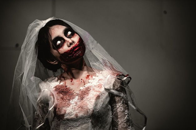Halloween festival conceptAsian woman makeup ghost faceBride zombie charactorHorror movie wallpaper or poster