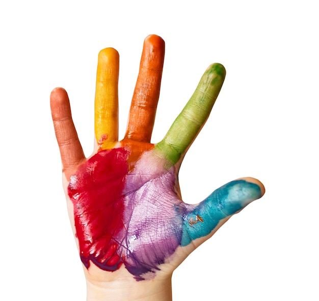 Hands of the child in multicolored paint Isolate Watercolor gouache paint brushes
