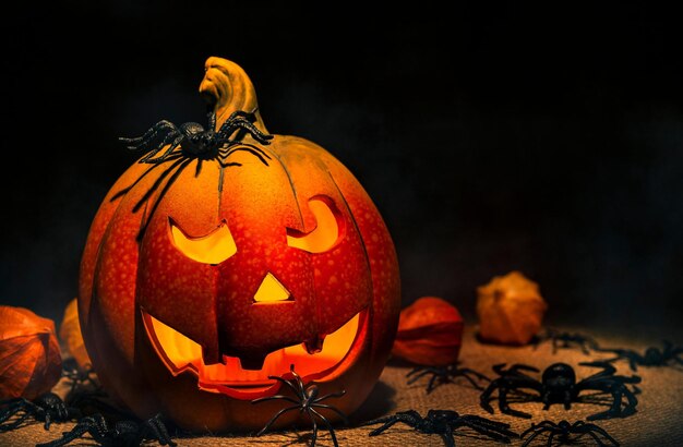 happy halloween banner or party invitation background with clouds bats and pumpkins