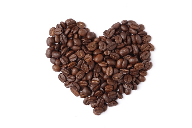 Heart made from coffee beans isolated on a white background.