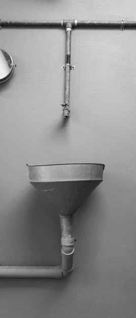High angle view of electric lamp on table against wall
