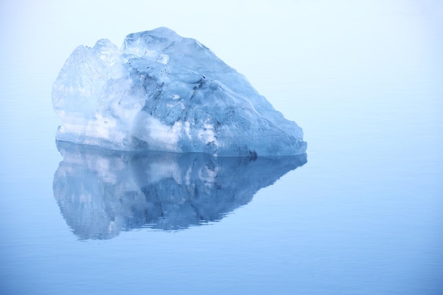 Ice berg on sea during foggy weather