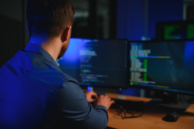 it technician person with technology for typing code future and data analytics
