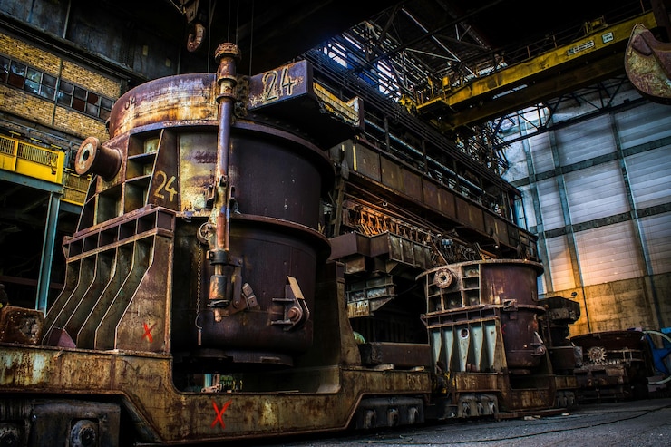 Foto large metallic machinery in factory