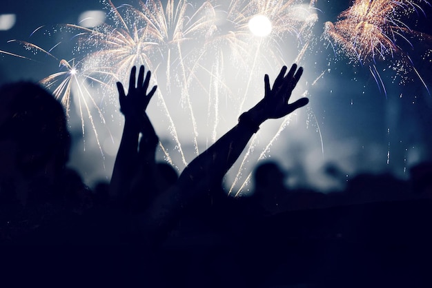 low angle view of firework display at night