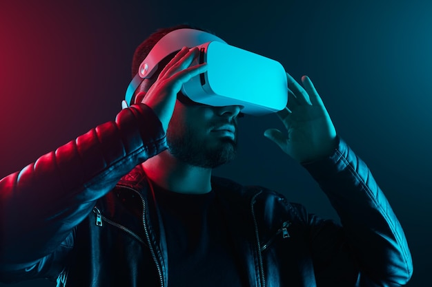 Man in vr glasses touching virtual world
