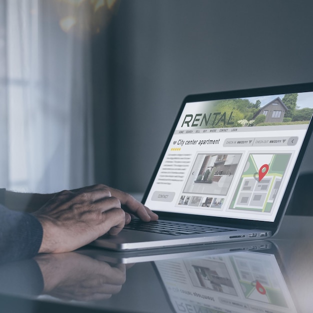 Man reading rental home ads online booking vacation in house for rent travel business concept