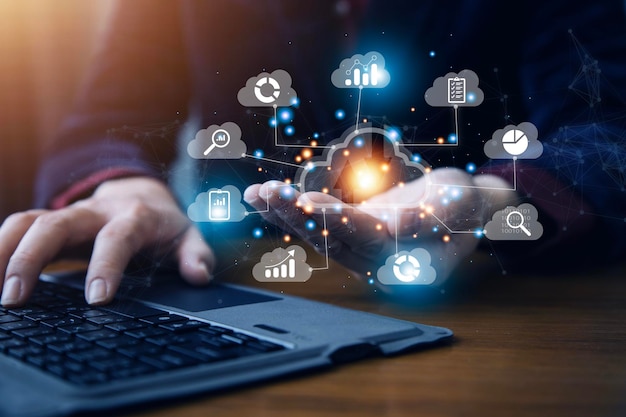 man use laptop with cloud computing diagram show on hand cloud technology data storage networking and internet service concept
