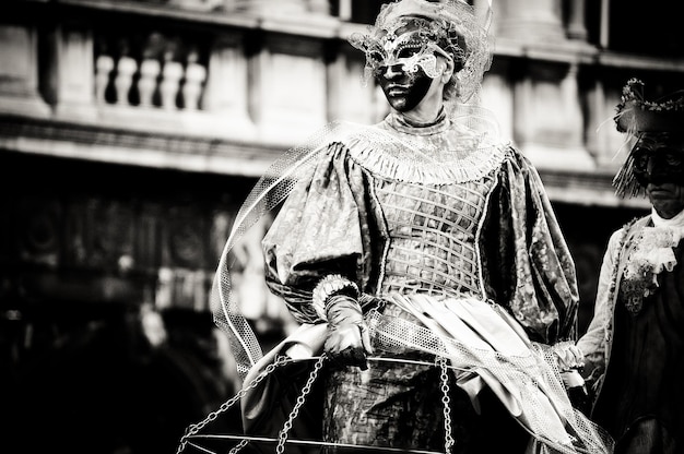 man wearing mask at carnival festival